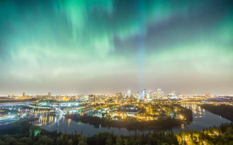 Nightscape Photos. Featured LIFELIGHTLENS image of Aurora Borealis above the skyline in Edmonton.