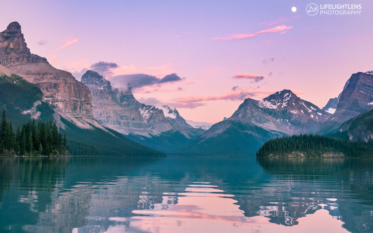 An image of a lake displayed on a MacBook Pro