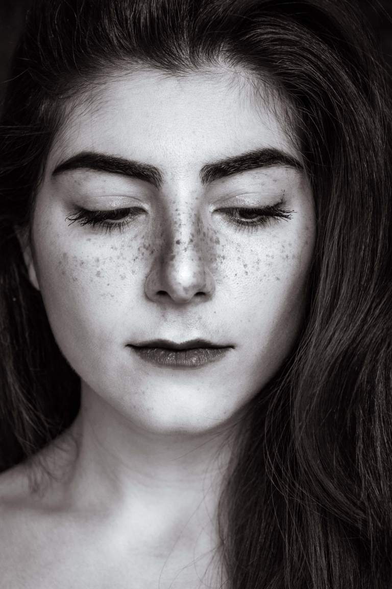 Portrait Photos. LIFELIGHTLENS image of a woman with freckles.